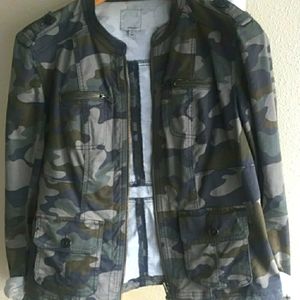 Camo jacket fits like a small